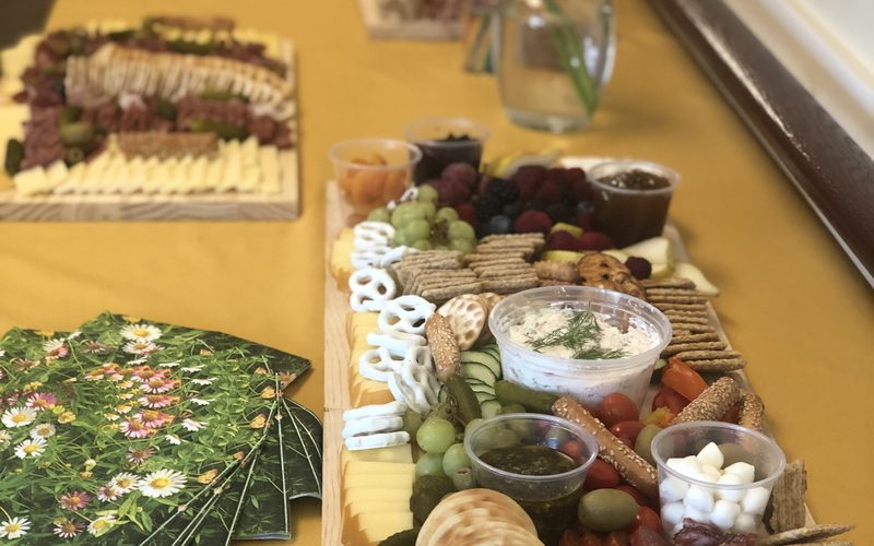 Long charcuterie grazing table catered for a large event in Eastern Wisconsin